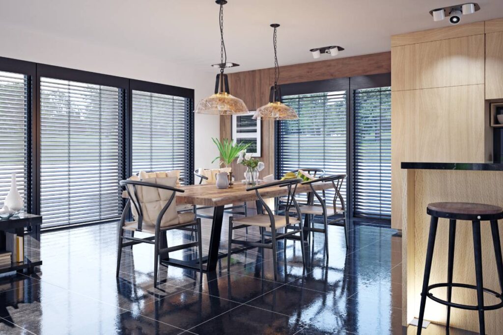 several sets of motorized blinds in a dining room 1200px