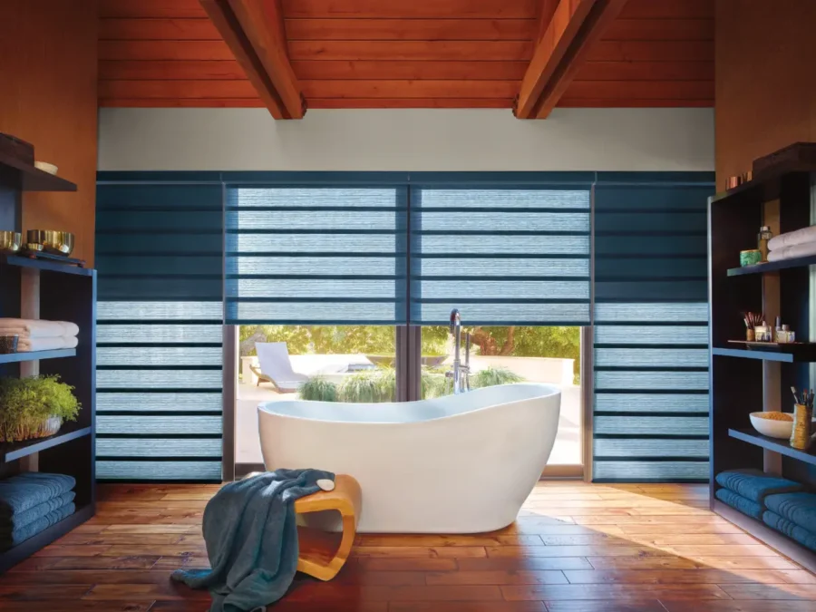 Custom-fit Vignette® Roman shades with PowerView® automation offer full control over light and privacy.