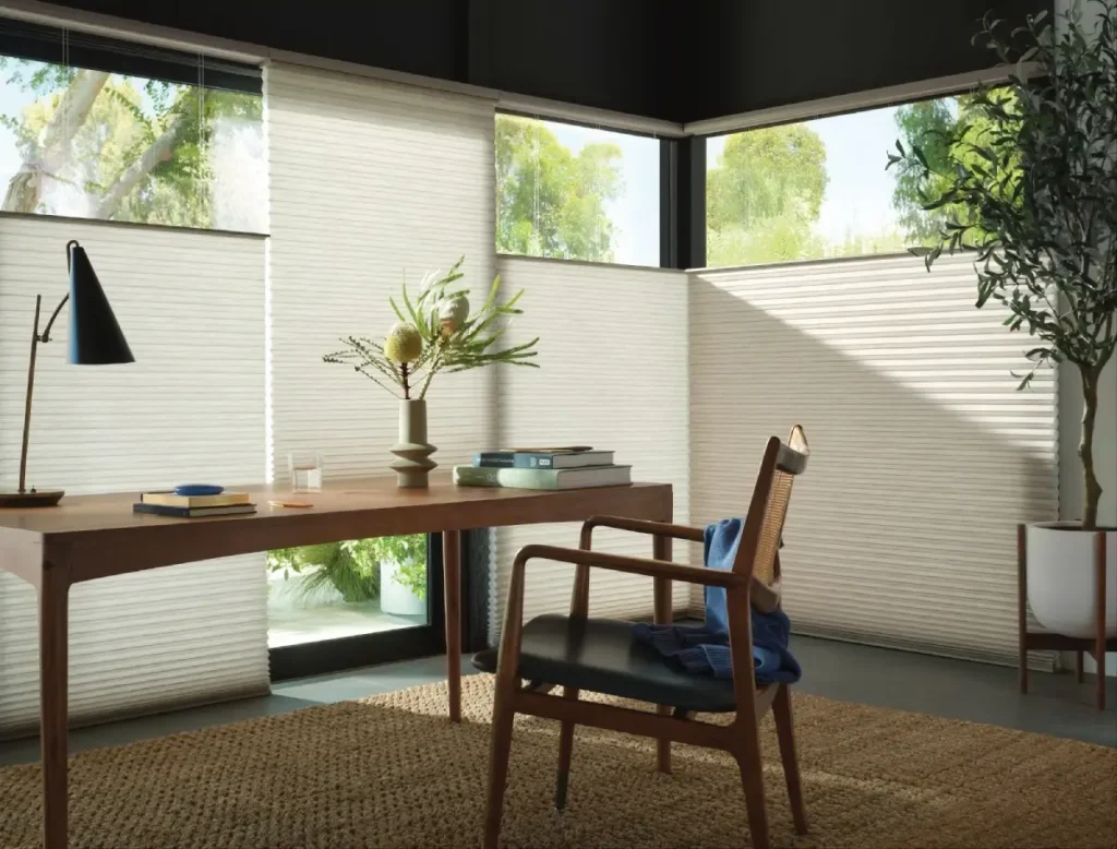 Top-Down Bottom-Up shades in a home office control glare without sacrificing natural light.
